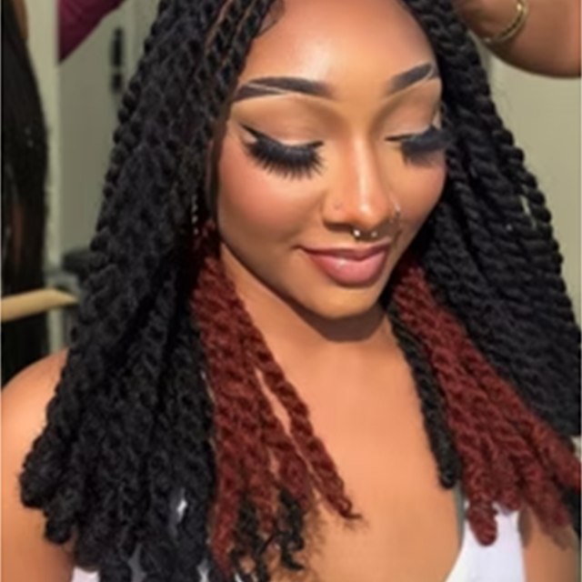 Long protective braids with curled ends